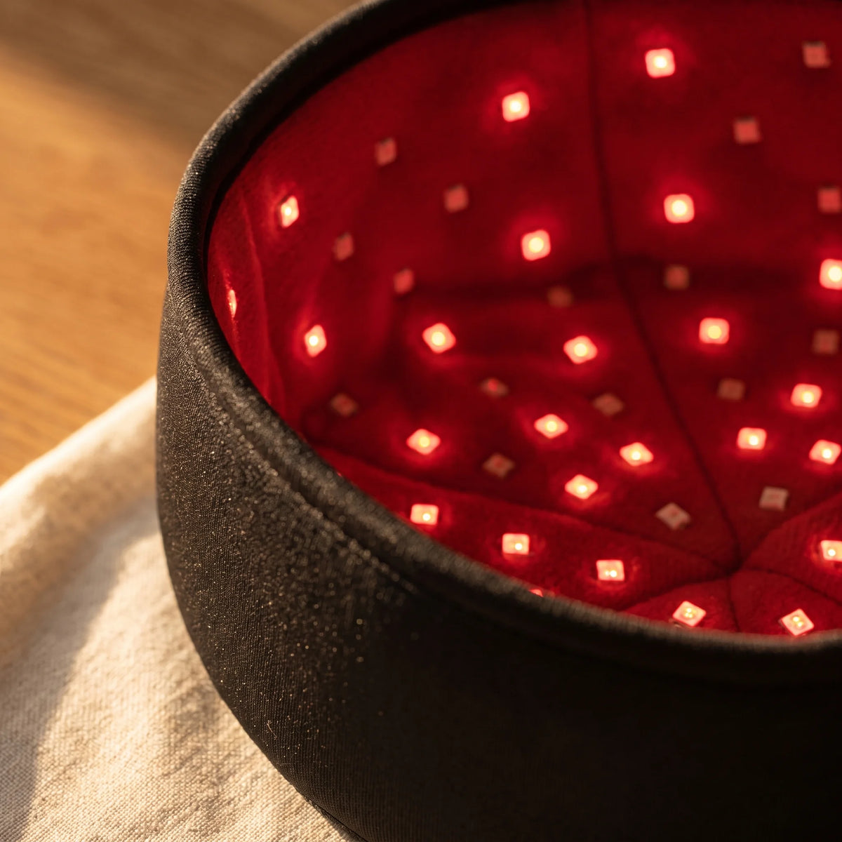 Inside of the Clinirae Scalp Light Cap showing the red LEDs